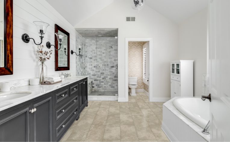 Travertine tile on the floors and fireplace in this brightly lit home