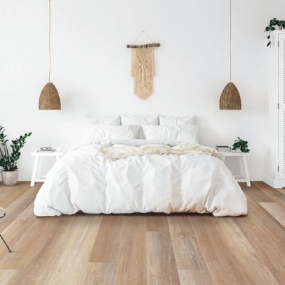 light luxury vinyl plank floors in a bright Akron bedroom